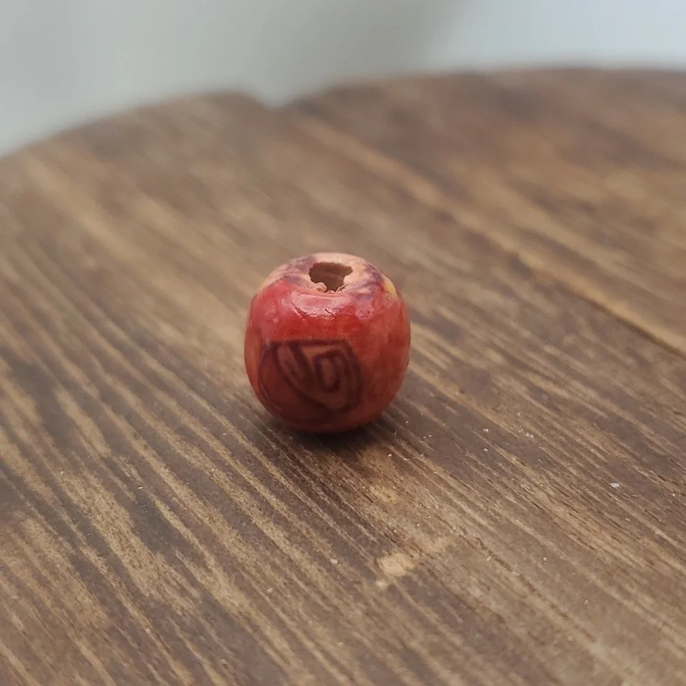 Tiki sunrise patterned bead charm‎
